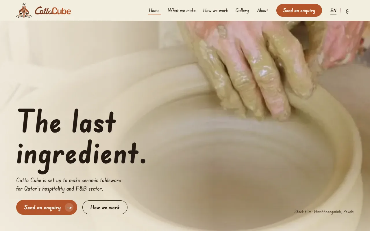 The Cotta Cube website home page on a desktop screen: a potter’s hands shaping clay on a wheel, with the headline The last ingredient.